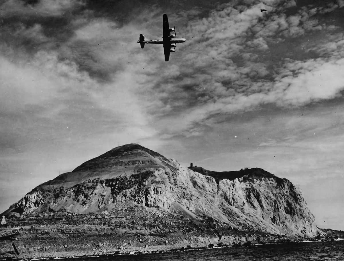 B-29_Superfortress_Flying_over_Mount_Suribachi_Iwo_Jima